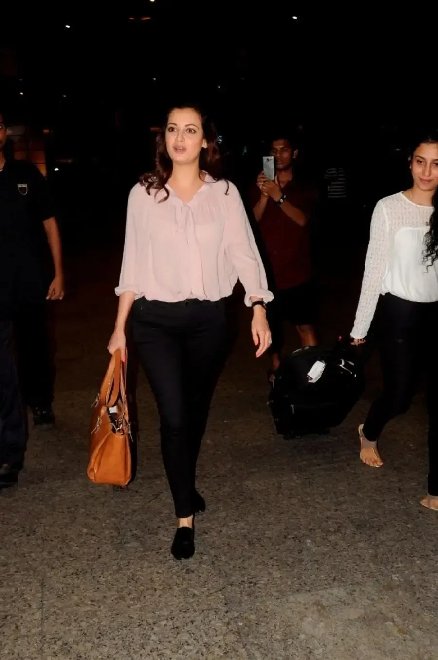 Bollywood Model Dia Mirza At Airport In Pink Top Black Jeans